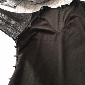 Black dress with see through sleeves and sides